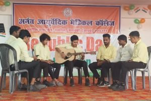 a group of boys singing with guitar in Arnav medial college in up